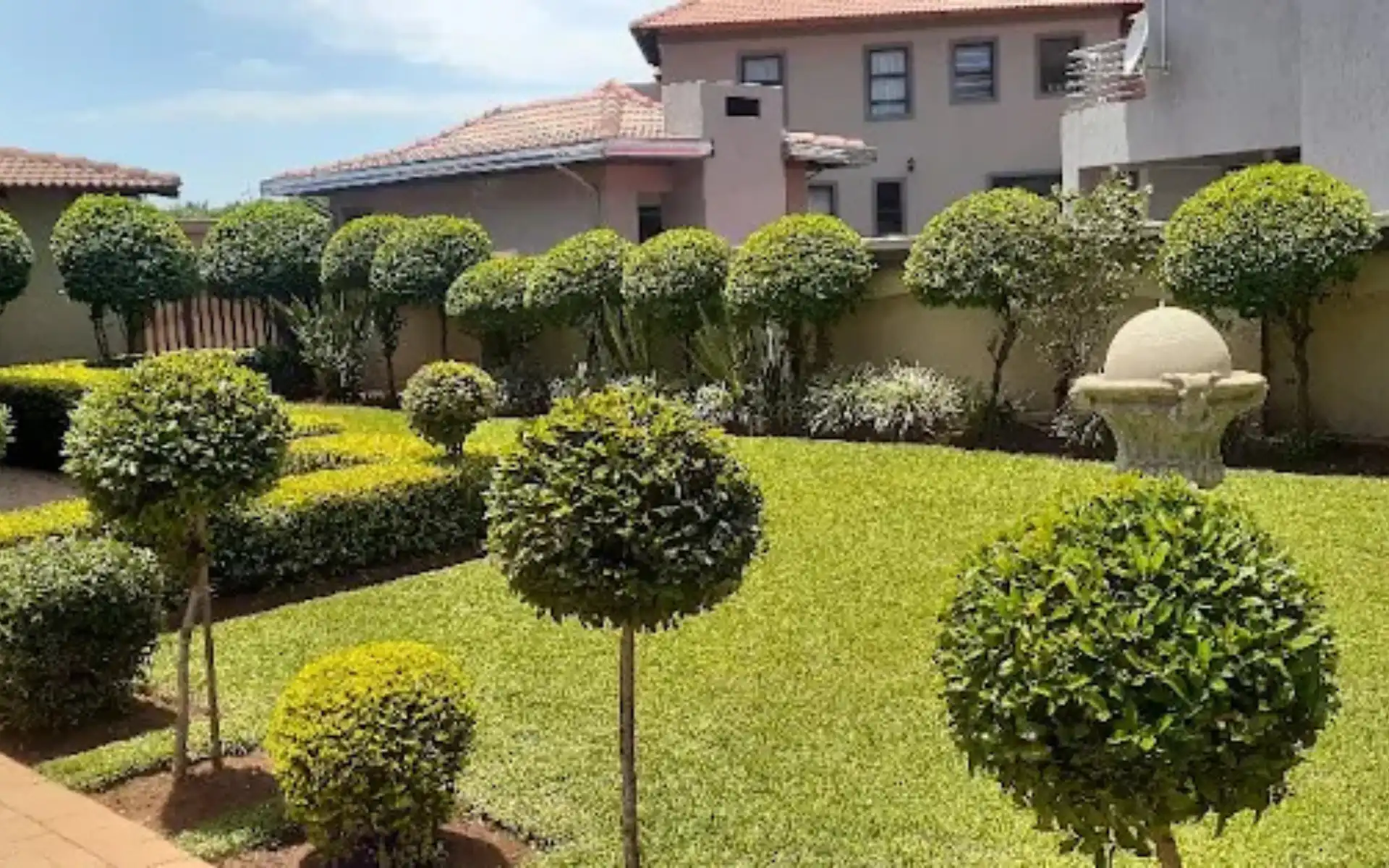 Complete landscape transformation with new beds, lawn and pathways